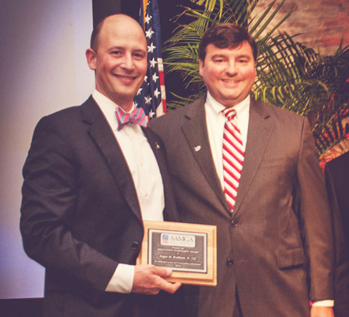 Gus Brabham is the Outstanding Chairman of the Year for his work on SC InsurPac committee. With AAMGA representative Robert Sanders, Jr.