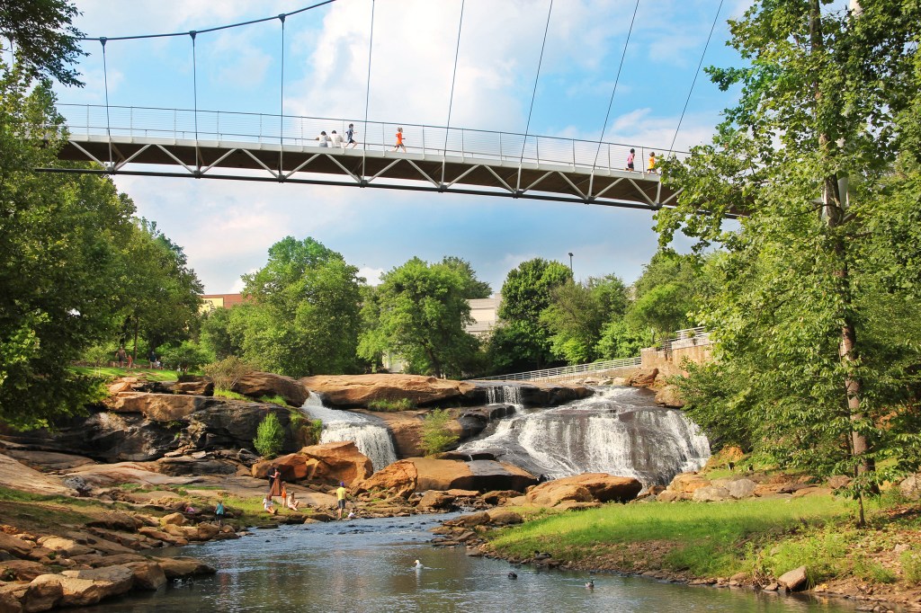 Liberty bridge in Greenville stretches over the Reedy River Falls.